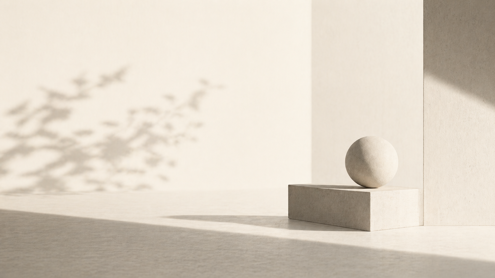 A minimalist architectural composition with a sphere resting on a block, casting a soft shadow