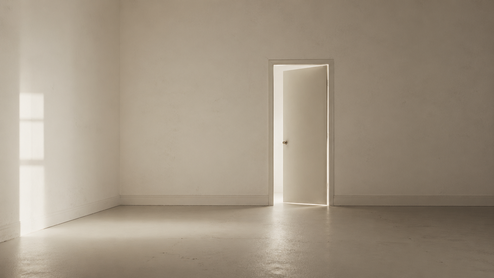 A minimal, off-white room with a single door slightly ajar, light spilling into an otherwise empty space.